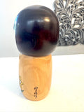 Usaburo Japanese Kokeshi Doll with Flowers